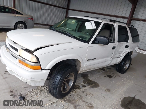 2004 Chevrolet Blazer LS z VIN 1GNDT13X64K129093, wystawiony jako IAAI lot #41860109 z przebiegiem 175 588 mil mil oraz . Historia ofert i sprzedaży dostępna na DreamBid. Obrazek 17.