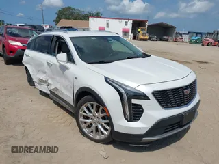 2019 Cadillac XT4 AWD Premium Luxury z VIN 1GYFZDR48KF131619, wystawiony jako IAAI lot #42202281 z przebiegiem 67 048 mil mil oraz . Historia ofert i sprzedaży dostępna na DreamBid. Obrazek 1.