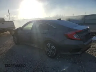2016 Honda Civic EX-T z VIN 2HGFC1F3XGH647117, wystawiony jako Copart lot #89222095 z przebiegiem 86 895 mil mil oraz Szkoda całkowita • Salvage title. Historia ofert i sprzedaży dostępna na DreamBid. Obrazek 2.