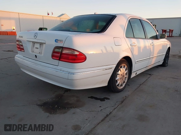 2001 Mercedes-Benz E-Class with VIN WDBJF65J91B249540, listed as a IAAI auction lot 41130248 with 107,582 mi miles. Bid and sale history available at carsss.com. Image 4.