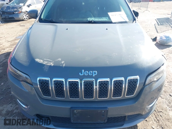 2020 Jeep Cherokee Limited with VIN 1C4PJLDB3LD606091, listed as a IAAI auction lot 41473098 with 49,819 mi miles. Bid and sale history available at carsss.com. Image 12.
