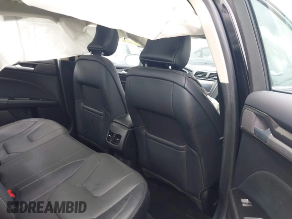 2019 Ford Fusion Titanium with VIN 3FA6P0K92KR248521, listed as a IAAI auction lot 42198307 with 51,844 mi miles and . Bid and sale history available at DreamBid. Image 8.