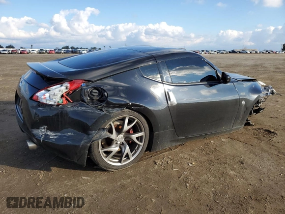 2013 Nissan 370Z with VIN JN1AZ4EH8DM382277, listed as a Copart auction lot 39709824 with 118,925 mi miles and Salvage Title. Bid and sale history available at carsss.com. Image 3.