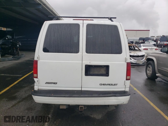 2003 Chevrolet Astro with VIN 1GNDM19XX3B123705, listed as a Copart auction lot 82614064 with 223,905 mi miles and Salvage Title. Bid and sale history available at DreamBid. Image 6.