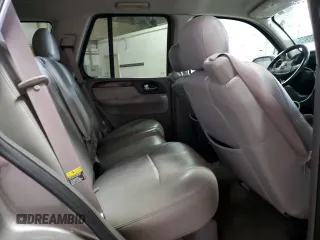 2005 GMC Envoy SLT z VIN 1GKDT13S652287033, wystawiony jako Copart lot #52508925 z przebiegiem 170 434 mil mil oraz Szkoda całkowita • Salvage title. Historia ofert i sprzedaży dostępna na DreamBid. Obrazek 11.