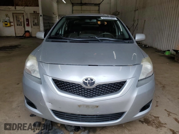2012 Toyota Yaris z VIN JTDBT4K30CL016555, wystawiony jako Copart lot #55605565 z przebiegiem 164 046 mil mil oraz Szkoda całkowita • Salvage title. Historia ofert i sprzedaży dostępna na DreamBid. Obrazek 5.