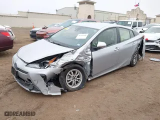 2022 Toyota Prius L Eco with VIN JTDKAMFU9N3185999, listed as a IAAI auction lot 41428106 with 50,798 mi miles. Bid and sale history available at carsss.com. Image 17.