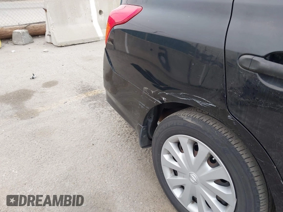 2015 Nissan Versa SV with VIN 3N1CN7AP2FL845918, listed as a IAAI auction lot 42111311 with 210,789 mi miles. Bid and sale history available at carsss.com. Image 12.