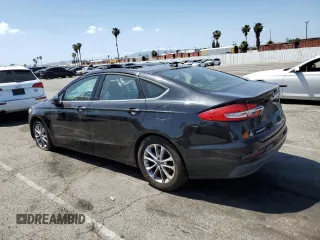 2020 Ford Fusion SE with VIN 3FA6P0HDXLR150768, listed as a Copart auction lot 57085365 with 141,855 mi miles and Salvage title. Bid and sale history available at DreamBid. Image 2.