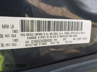 2013 Dodge Grand Caravan SXT with VIN 2C4RDGCG4DR602893, listed as a IAAI auction lot 41747242 with 206,213 mi miles and . Bid and sale history available at DreamBid. Image 9.