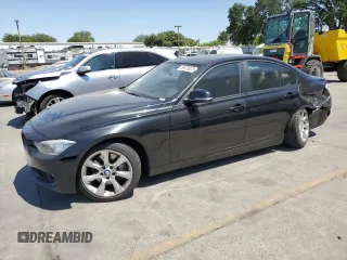 2013 BMW 3 Series 335i xDrive with VIN WBA3B9C51DF587019, listed as a Copart auction lot 59373025 with 118,723 mi miles and Salvage title. Bid and sale history available at DreamBid. Image 1.