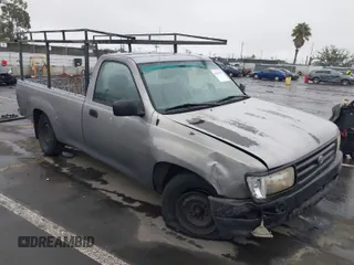 1993 Toyota T100 DX with VIN JT4VD10AXP0011252, listed as a IAAI auction lot 41524638 with 172,794 mi miles. Bid and sale history available at carsss.com. Image 1.