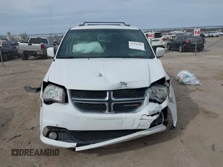 2018 Dodge Grand Caravan SXT with VIN 2C4RDGCG2JR283490, listed as a IAAI auction lot 41796929 with 157,836 mi miles and . Bid and sale history available at DreamBid. Image 12.