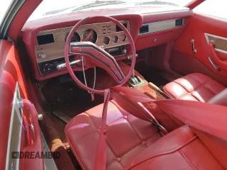 1977 Ford Mustang z VIN 7F04Z150204, wystawiony jako Copart lot #77276344 z przebiegiem 94 802 mil mil oraz Szkoda całkowita • Salvage title. Historia ofert i sprzedaży dostępna na DreamBid. Obrazek 8.