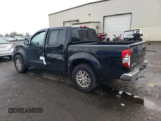 2016 Nissan Frontier S with VIN 1N6AD0EV3GN797075, listed as a Copart auction lot 86207984 with 132,836 mi miles and Salvage title. Bid and sale history available at DreamBid. Image 2.