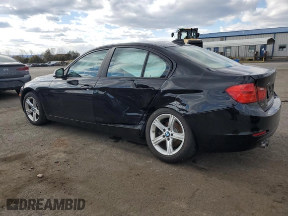 2015 BMW 3 Series 328i xDrive with VIN WBA3B5C52FF960001, listed as a Copart auction lot 52235695 with 80,950 mi miles and Salvage Title. Bid and sale history available at carsss.com. Image 2.