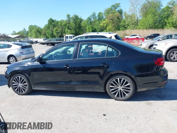 2015 Volkswagen Jetta SE z VIN 3VWD17AJ0FM348432, wystawiony jako IAAI lot #42124810 z przebiegiem 129 034 mil mil oraz . Historia ofert i sprzedaży dostępna na DreamBid. Obrazek 15.