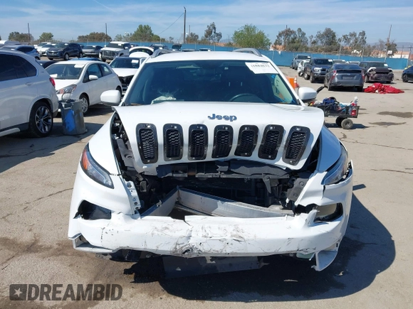 2016 Jeep Cherokee High Altitude with VIN 1C4PJLDB1GW264358, listed as a IAAI auction lot 41884632 with 87,250 mi miles. Bid and sale history available at carsss.com. Image 12.