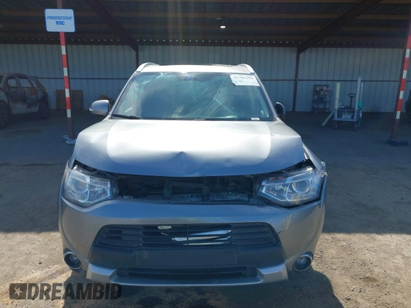 2015 Mitsubishi Outlander GT with VIN JA4JZ4AX1FZ005879, listed as a IAAI auction lot 41701299 with 212,805 mi miles and . Bid and sale history available at DreamBid. Image 12.