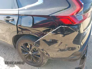 2023 Honda CR-V Sport Touring with VIN 2HKRS6H97PH804042, listed as a IAAI auction lot 42041207 with 19,152 mi miles and . Bid and sale history available at DreamBid. Image 6.