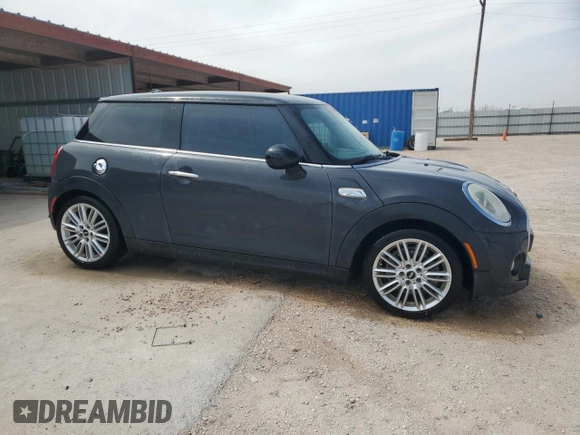 2014 MINI Hardtop S with VIN WMWXM7C50ET985583, listed as a Copart auction lot 50820675 with 75,759 mi miles and Clean Title. Bid and sale history available at DreamBid. Image 4.