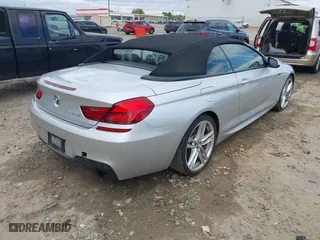 2013 BMW 6 Series 640i with VIN WBALW7C52DDX58705, listed as a IAAI auction lot 41848280 with 91,243 mi miles. Bid and sale history available at carsss.com. Image 4.