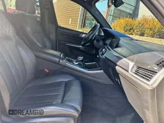 2021 BMW X5 M50i with VIN 5UXJU4C09M9H07838, listed as a Copart auction lot 47020525 with 57,200 mi miles and Clean Title. Bid and sale history available at carsss.com. Image 5.