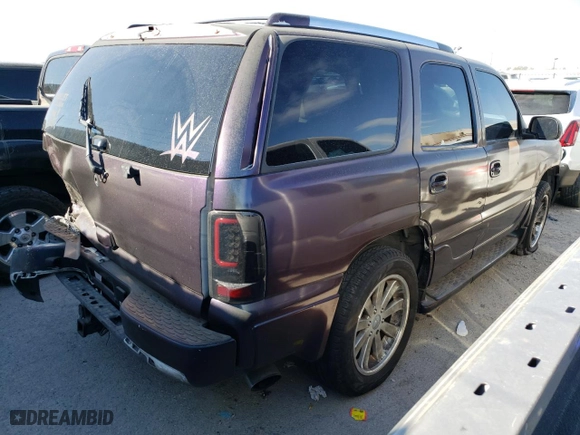 2002 GMC Yukon Denali with VIN 1GKEK63U62J340241, listed as a Copart auction lot 71122174 with 259,297 mi miles and Salvage Title. Bid and sale history available at carsss.com. Image 3.