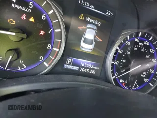 2014 Infiniti Q50 Premium with VIN JN1BV7AR8EM690406, listed as a IAAI auction lot 41525545 with 163,582 mi miles. Bid and sale history available at carsss.com. Image 15.
