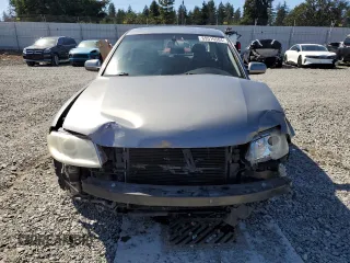 2003 Volkswagen Passat GLX z VIN WVWRH63B93P354188, wystawiony jako Copart lot #69510584 z przebiegiem 125 225 mil mil oraz Szkoda całkowita • Salvage title. Historia ofert i sprzedaży dostępna na DreamBid. Obrazek 5.