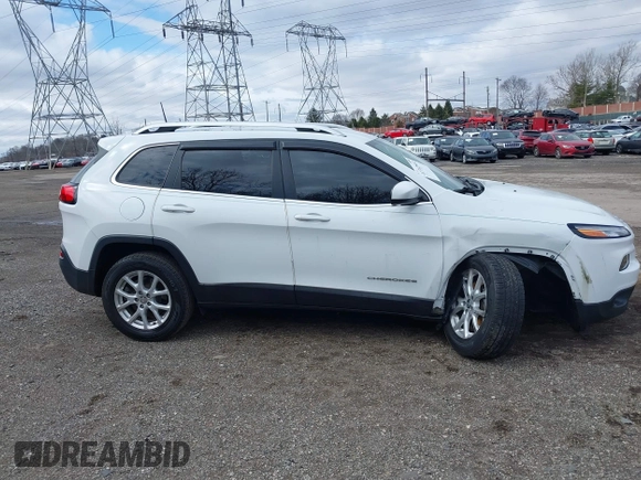 2017 Jeep Cherokee Latitude with VIN 1C4PJMCS7HW635967, listed as a IAAI auction lot 41742842 with 54,782 mi miles and . Bid and sale history available at DreamBid. Image 14.