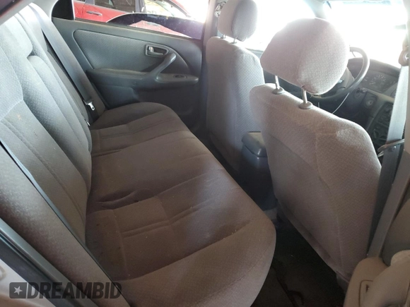 2001 Toyota Camry CE z VIN 4T1BG22K11U017054, wystawiony jako Copart lot #57623485 z przebiegiem 242 217 mil mil oraz Szkoda całkowita • Salvage title. Historia ofert i sprzedaży dostępna na DreamBid. Obrazek 10.