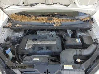 2006 Hyundai Tucson GL with VIN KM8JM12B46U461583, listed as a Copart auction lot 51854405 with 146,951 mi miles and Salvage Title. Bid and sale history available at carsss.com. Image 12.