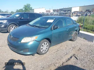 2009 Toyota Corolla with VIN 1NXBU40E39Z018168, listed as a IAAI auction lot 42661070 with 249,008 mi miles and . Bid and sale history available at DreamBid. Image 2.