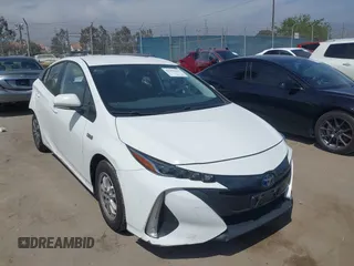 2021 Toyota Prius LE z VIN JTDKAMFP8M3193049, wystawiony jako IAAI lot #42293235 z przebiegiem 163 401 mil mil oraz . Historia ofert i sprzedaży dostępna na DreamBid. Obrazek 1.