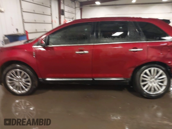 2014 Lincoln MKX z VIN 2LMDJ8JK7EBL00900, wystawiony jako IAAI lot #41714762 z przebiegiem 129 870 mil mil oraz . Historia ofert i sprzedaży dostępna na DreamBid. Obrazek 14.