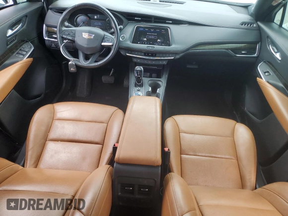 2020 Cadillac XT4 FWD Premium Luxury z VIN 1GYFZCR4XLF005029, wystawiony jako Copart lot #55274025 z przebiegiem 50 550 mil mil oraz Szkoda całkowita • Salvage title. Historia ofert i sprzedaży dostępna na DreamBid. Obrazek 8.