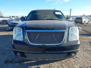 2013 GMC Yukon Denali with VIN 1GKS2EEF7DR310276, listed as a IAAI auction lot 41432983 with 243,119 mi miles. Bid and sale history available at carsss.com. Image 12.
