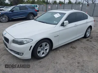 2013 BMW 5 Series 528i xDrive with VIN WBAXH5C5XDD106981, listed as a IAAI auction lot 42012477 with 140,259 mi miles. Bid and sale history available at carsss.com. Image 2.