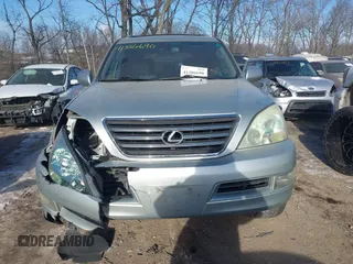 2003 Lexus GX 470 with VIN JTJBT20XX30015034, listed as a IAAI auction lot 41386690 with 234,983 mi miles. Bid and sale history available at carsss.com. Image 12.