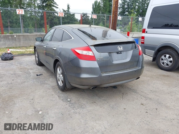 2010 Honda Crosstour EX z VIN 5J6TF1H36AL000580, wystawiony jako IAAI lot #42437917 z przebiegiem 202 259 mil mil oraz . Historia ofert i sprzedaży dostępna na DreamBid. Obrazek 3.