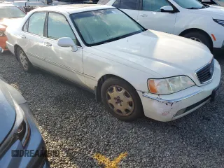 2000 Acura RL with VIN JH4KA9654YC000685, listed as a Copart auction lot 73986054 with 0 mi miles and Salvage Title. Bid and sale history available at carsss.com. Image 4.
