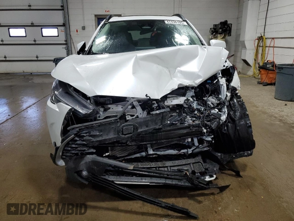 2023 Toyota Corolla Cross XLE with VIN 7MUDAABG9PV074996, listed as a Copart auction lot 47436105 with 21,766 mi miles and Salvage title. Bid and sale history available at DreamBid. Image 5.