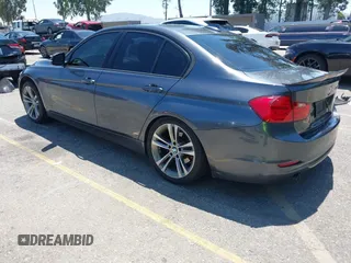 2014 BMW 3 Series 328d with VIN WBA3D3C51EK155031, listed as a IAAI auction lot 42149784 with 204,521 mi miles and . Bid and sale history available at carsss.com. Image 3.