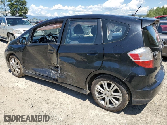 2011 Honda Fit Sport with VIN JHMGE8H57BC024827, listed as a Copart auction lot 59704194 with 146,316 mi miles and Salvage Title. Bid and sale history available at DreamBid. Image 2.