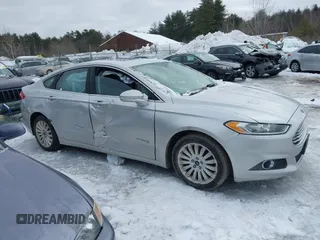 2014 Ford Fusion SE Hybrid with VIN 3FA6P0LUXER172442, listed as a IAAI auction lot 41623540 with 195,843 mi miles. Bid and sale history available at carsss.com. Image 13.