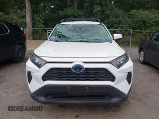 2019 Toyota RAV4 Hybrid LE with VIN JTMMWRFV9KD021285, listed as a IAAI auction lot 42757660 with 74,870 mi miles and . Bid and sale history available at DreamBid. Image 12.