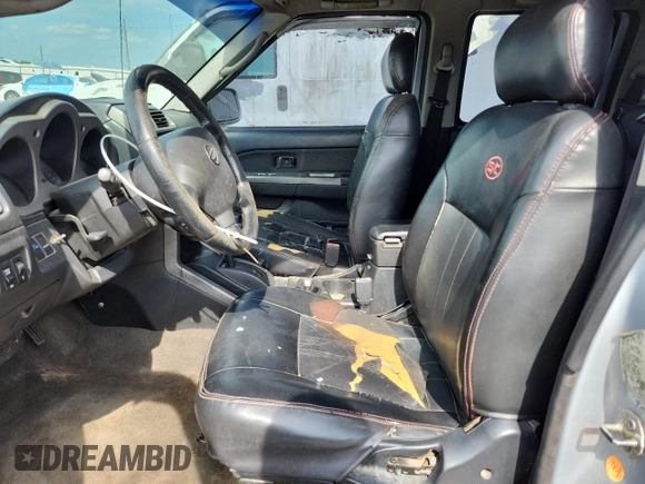 2002 Nissan Frontier XE with VIN 1N6ED29X82C340808, listed as a Copart auction lot 63927075 with 306,615 mi miles and Clean title. Bid and sale history available at DreamBid. Image 7.