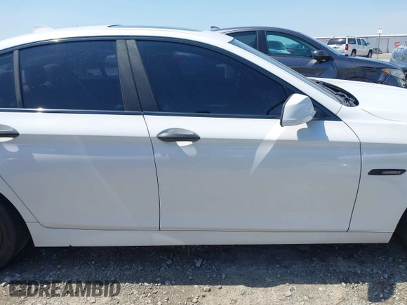 2013 BMW 5 Series 528i xDrive with VIN WBAXH5C52DD113388, listed as a IAAI auction lot 41997250 with 145,990 mi miles and . Bid and sale history available at carsss.com. Image 14.
