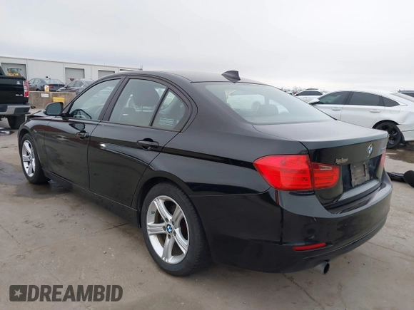 2013 BMW 3 Series 320i with VIN WBA3B1C51DK129473, listed as a IAAI auction lot 41591999 with 80,389 mi miles. Bid and sale history available at carsss.com. Image 3.